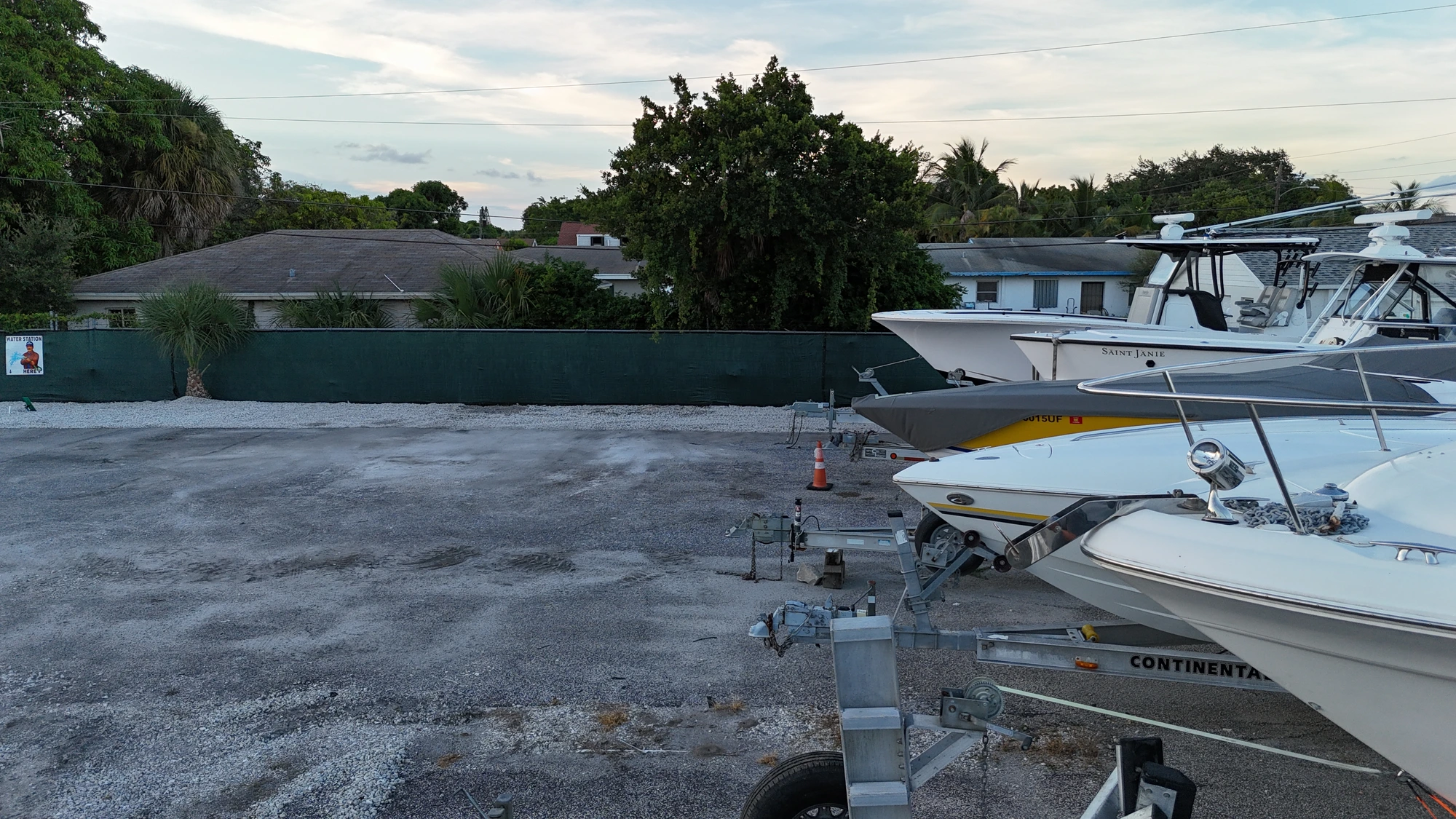 Boats along the privacy fence at Avenue E