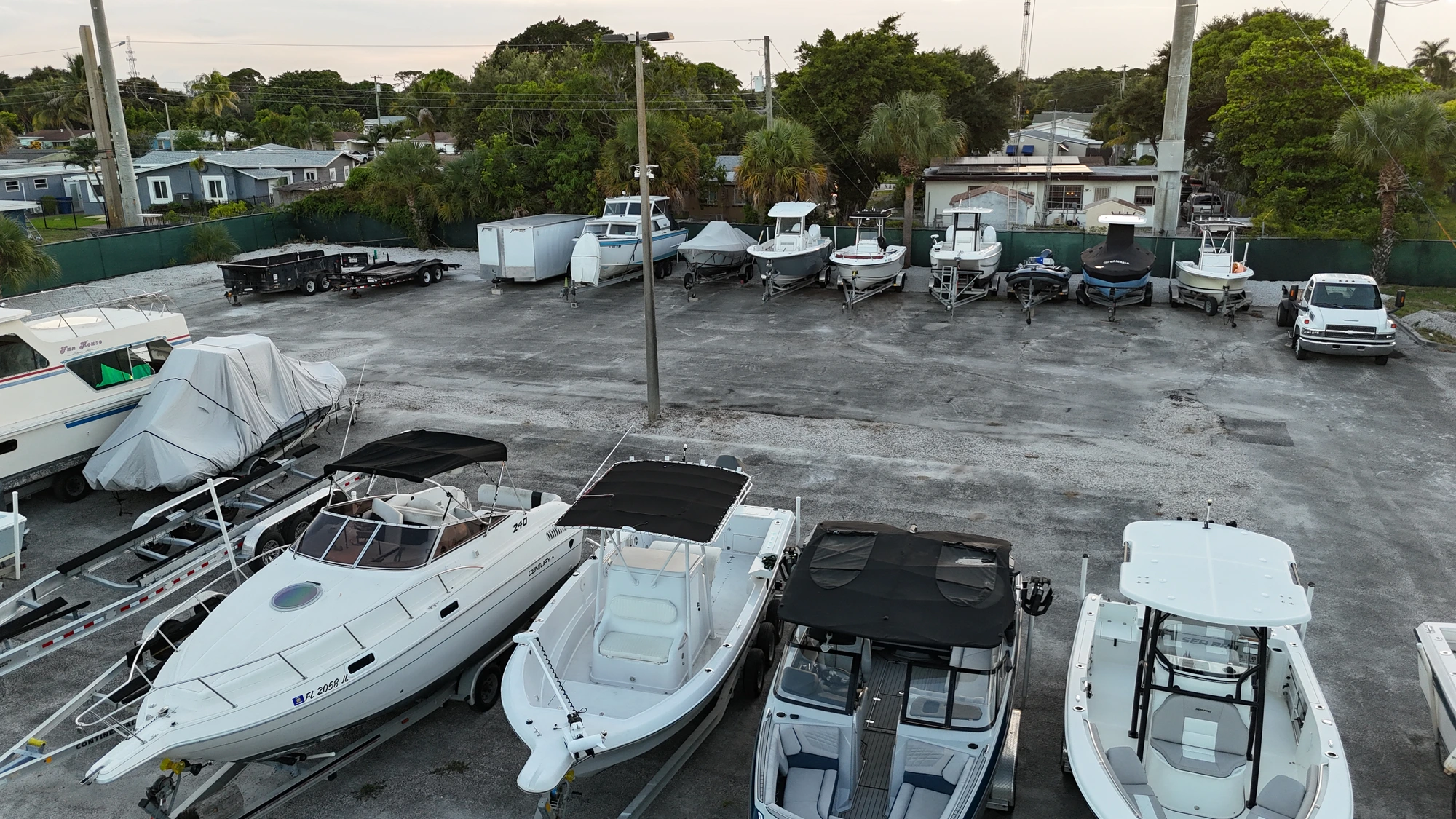 Boats and trailers parked at 3551 Avenue E