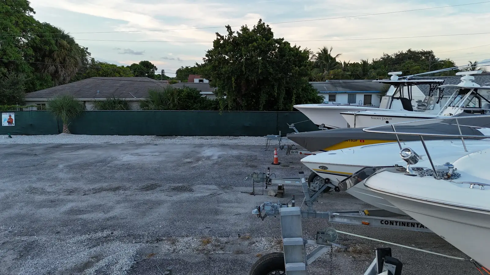 Boats along the privacy fence at Avenue E
